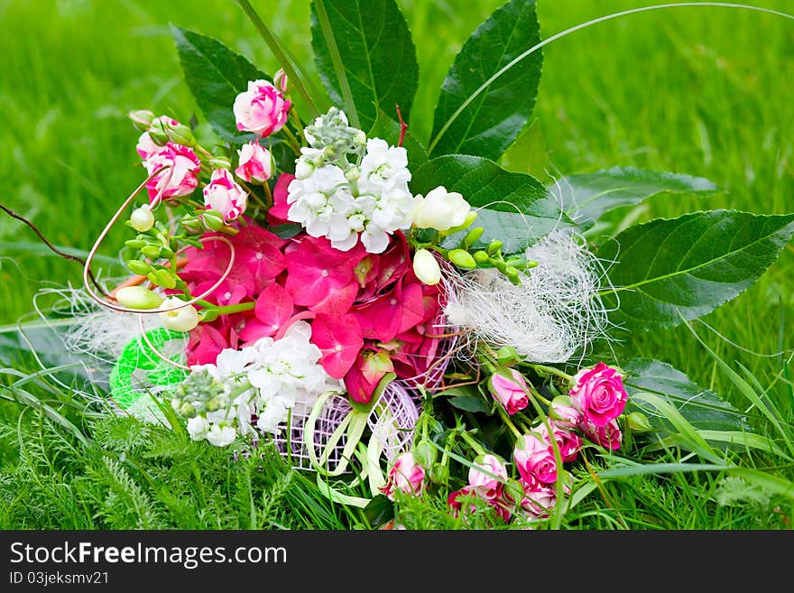 Colorful bunch of flowers on the lawn