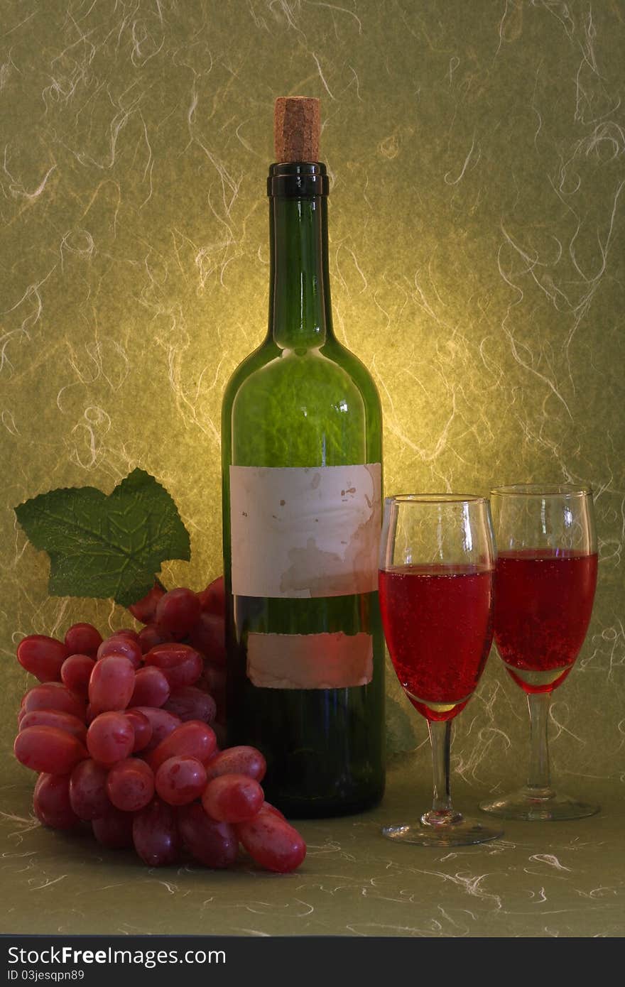 red wine on green background