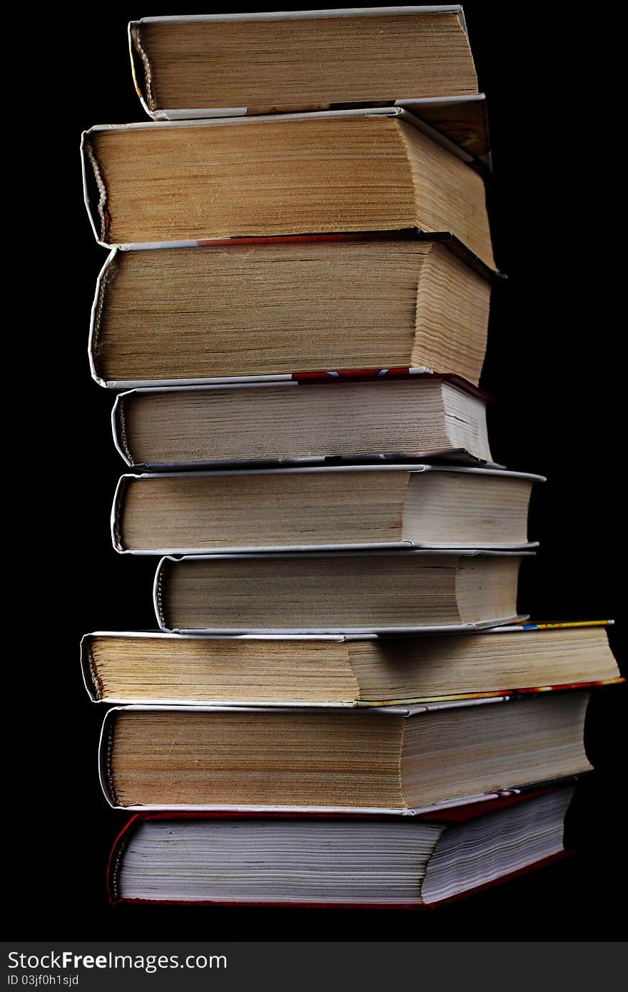 The book, on a dark background in the studio. The book, on a dark background in the studio.