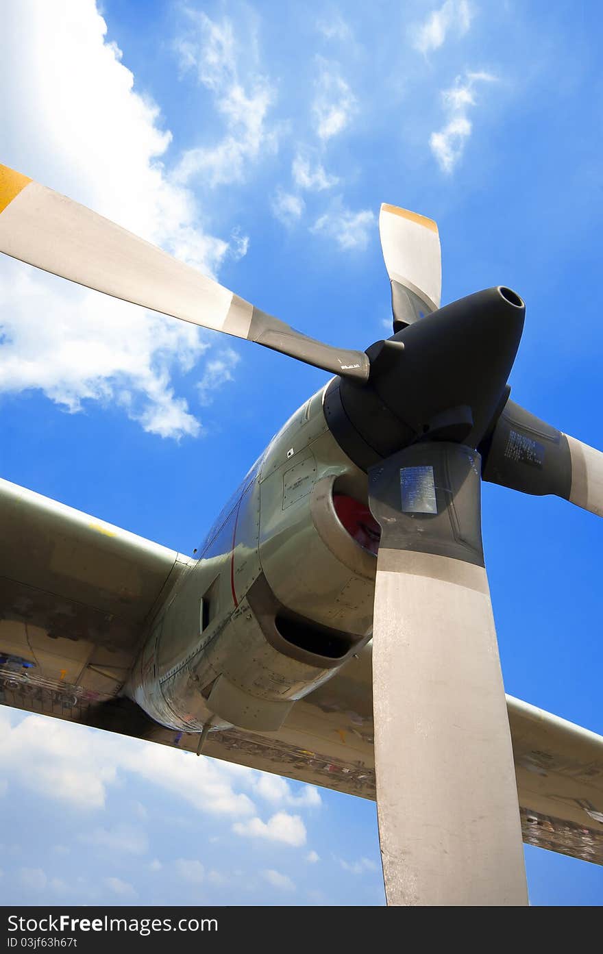 Airplane propeller on blue sky