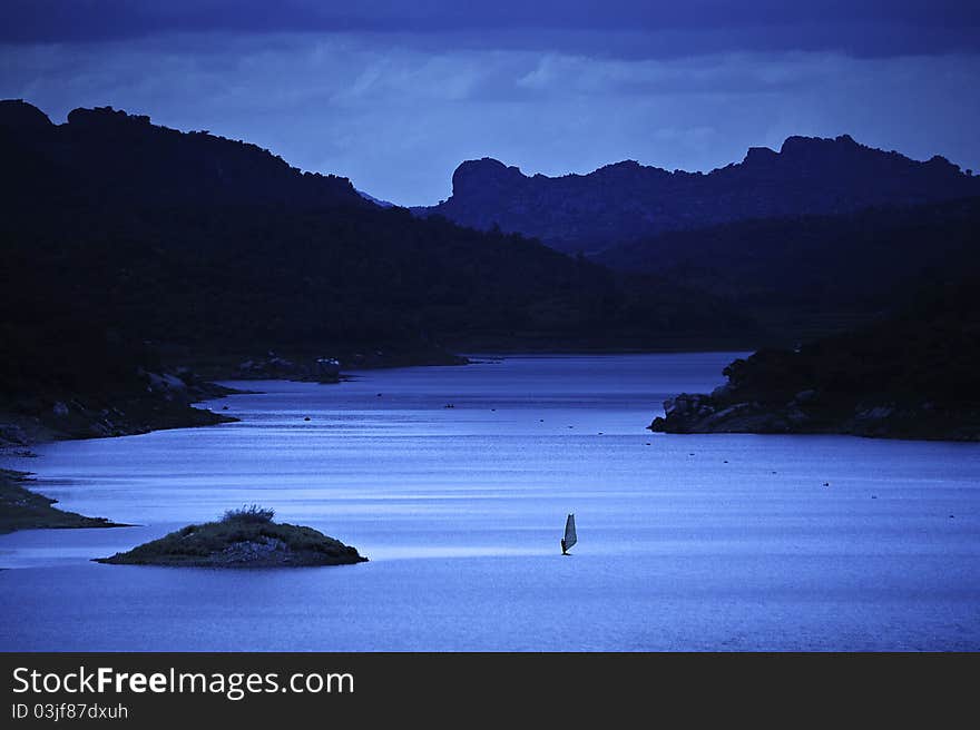 A Windsurfer In The Lake