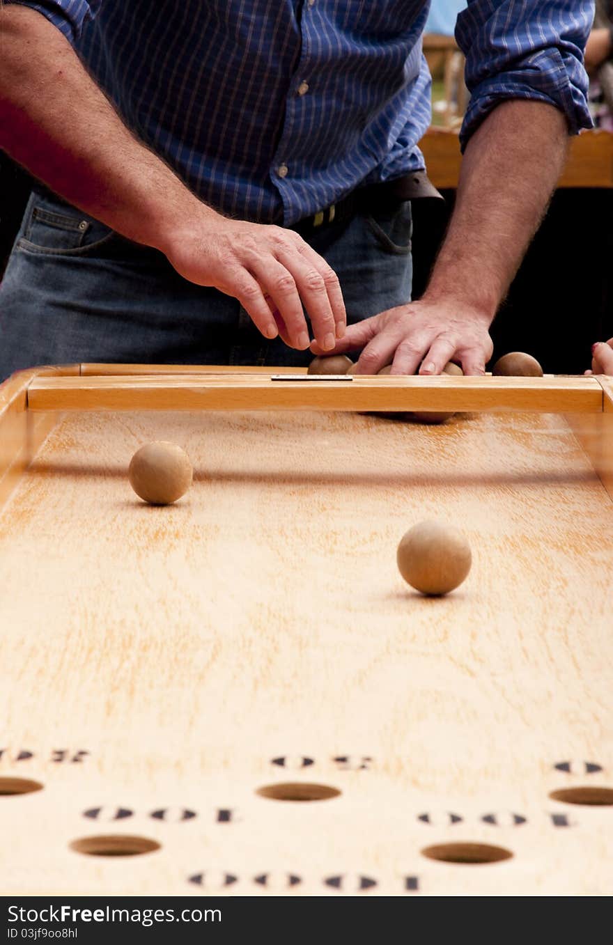 Man Playing Japanese traditional billiards. Man Playing Japanese traditional billiards