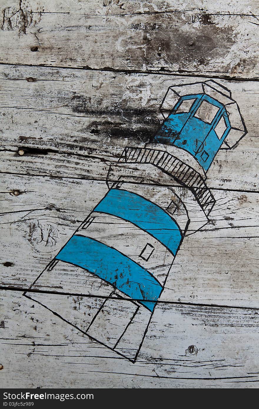 Lighthouse on wooden board