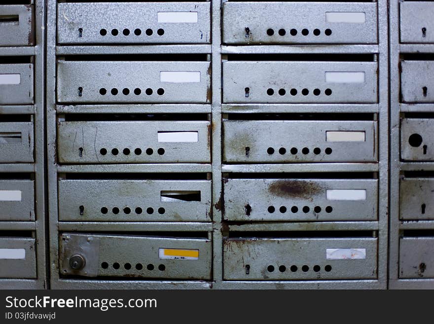 Many old metal mailboxes. Many old metal mailboxes