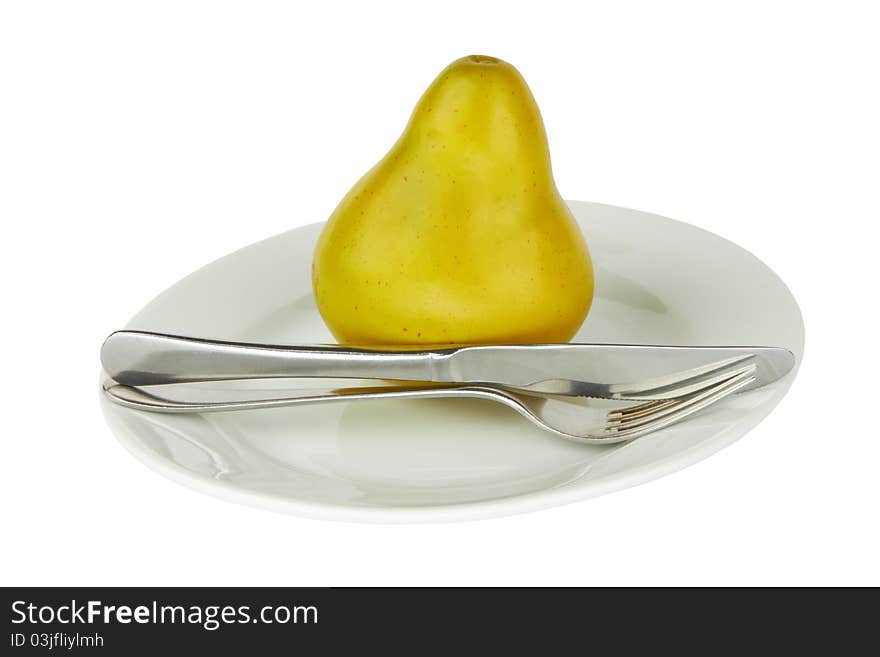 Pear on a plate isolated on white background