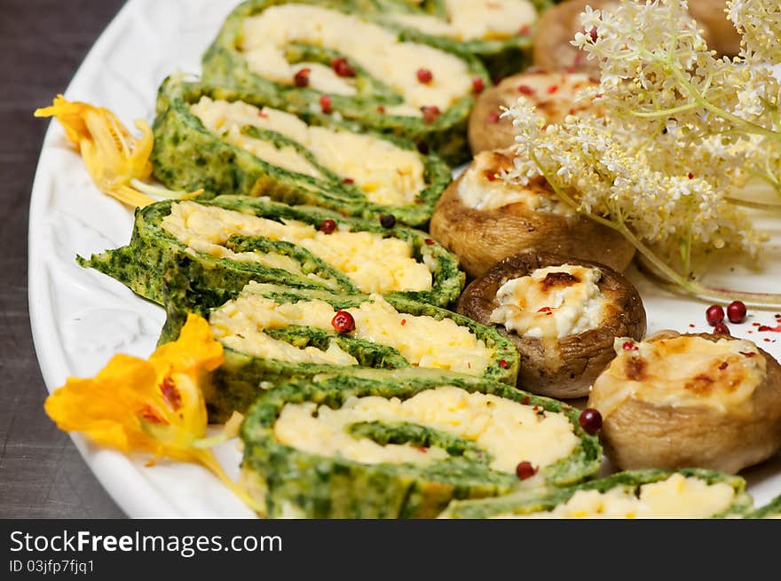 Baked pastries with red pepper, mushrooms and spinach