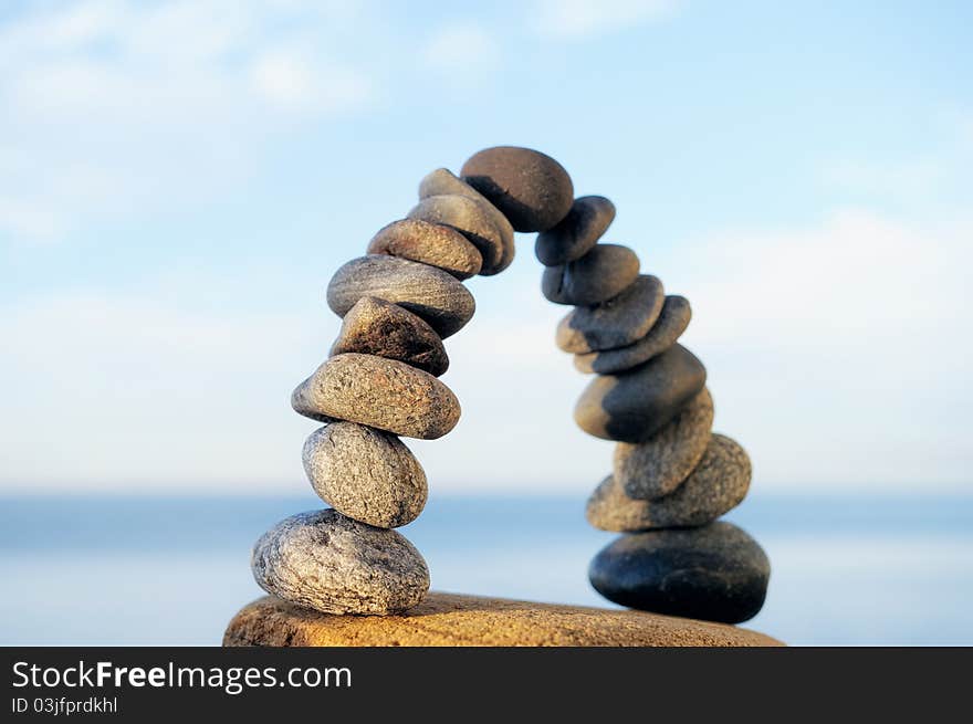 Arc crookedness of the pebbles on the seashore. Arc crookedness of the pebbles on the seashore