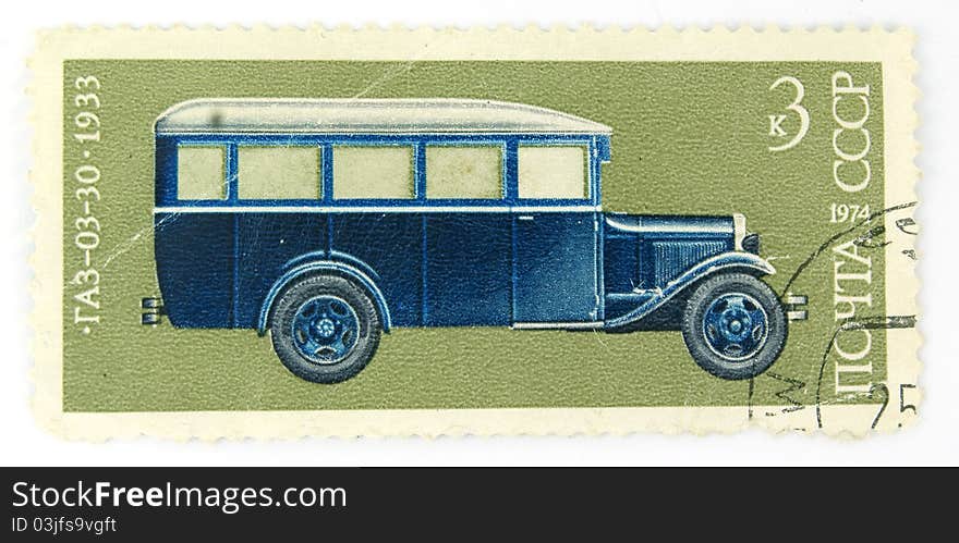 A cancelled stamp with a bus