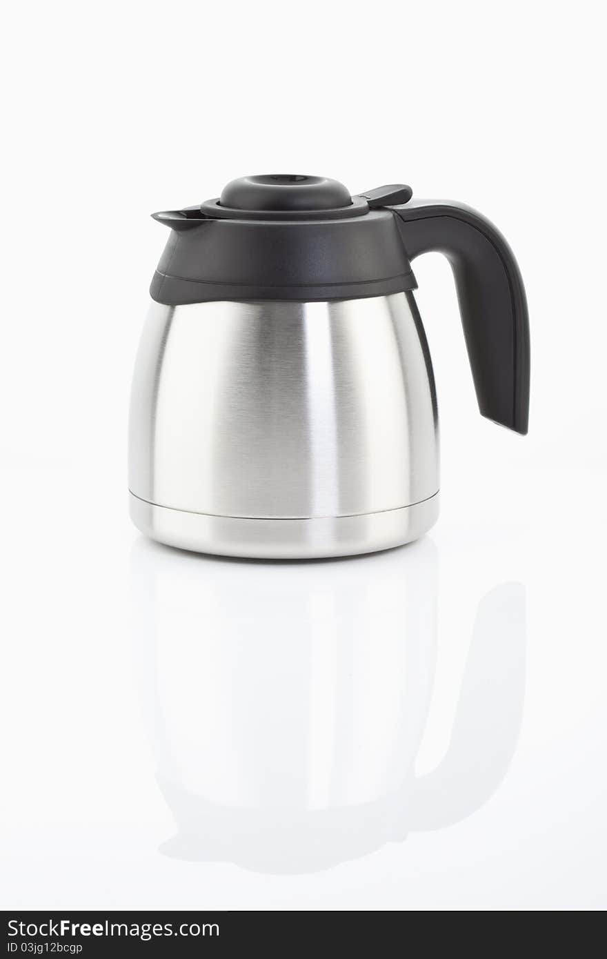 A chrome-plated thermos flask on white background