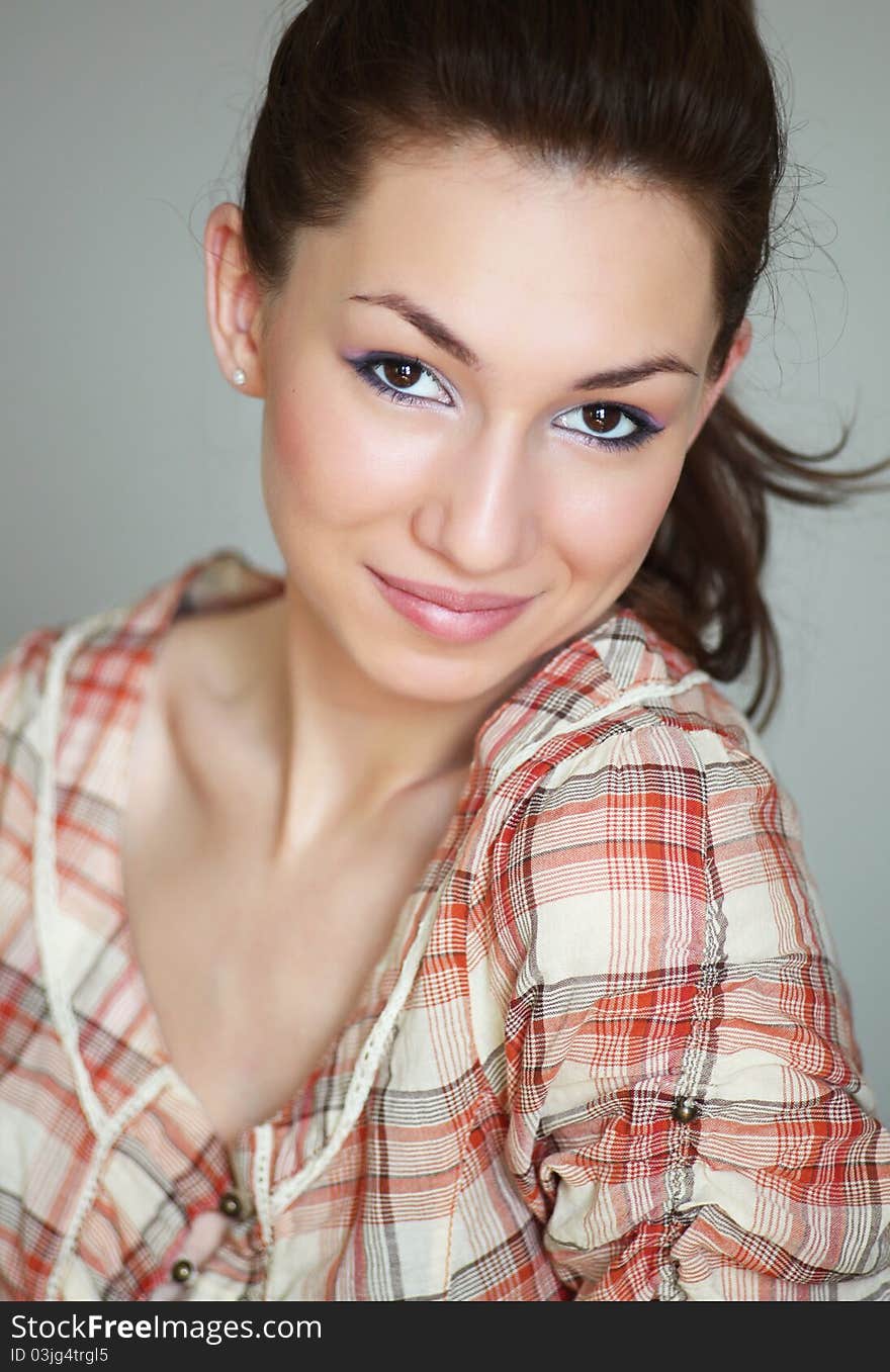 Closeup portrait of a beautiful young lady smiling. Closeup portrait of a beautiful young lady smiling