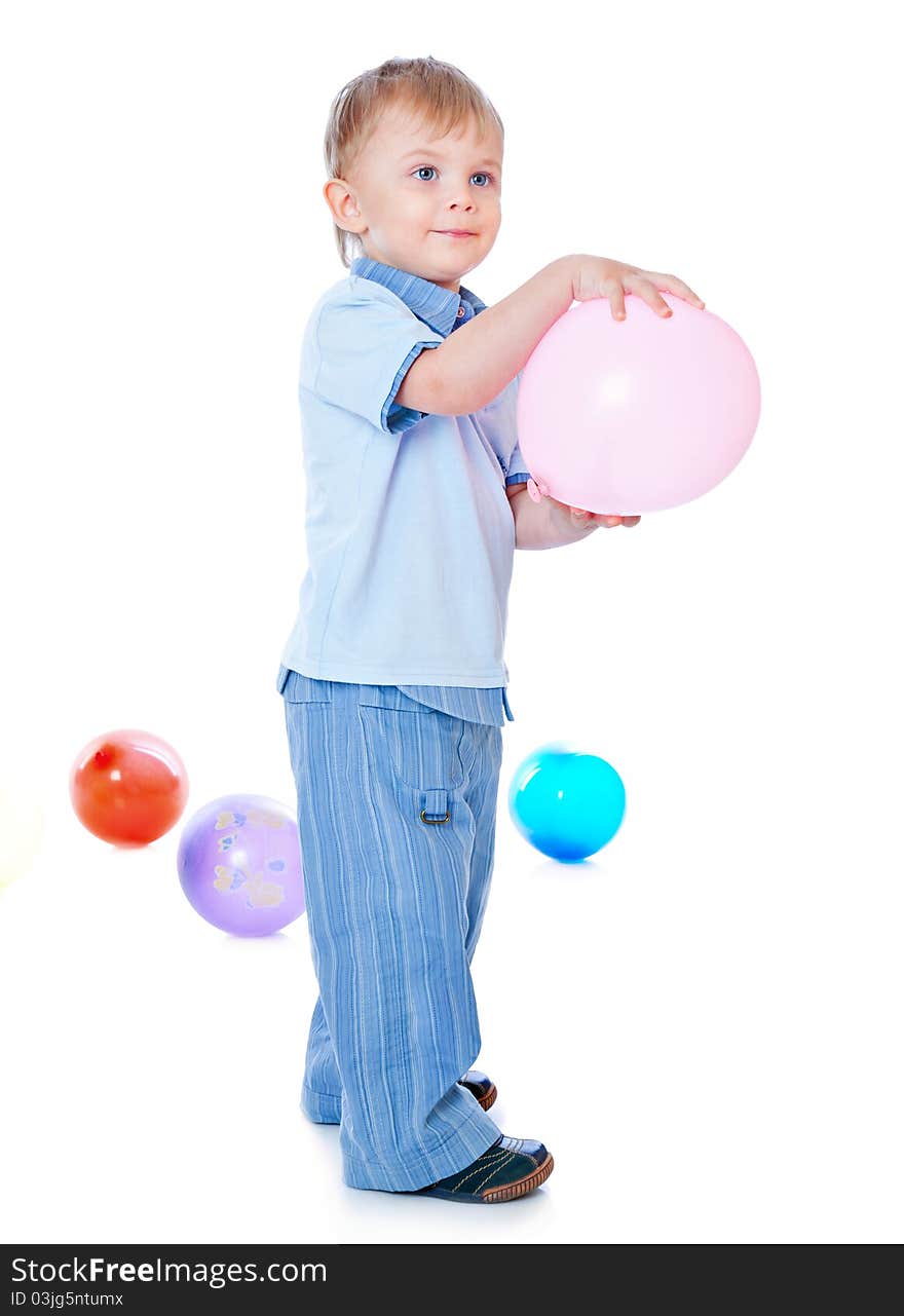 Little boy in balloons. Isolated on white background