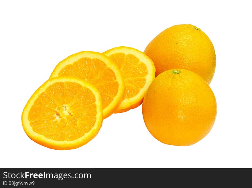 Ripe orange fruits isolated - whole and sliced - full of vitamins. Ripe orange fruits isolated - whole and sliced - full of vitamins