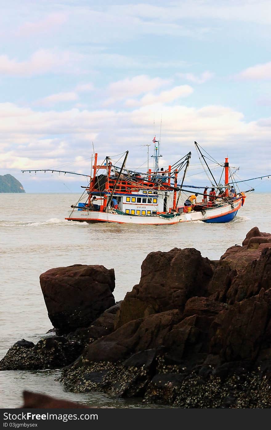 The fishing boats go to open sea.