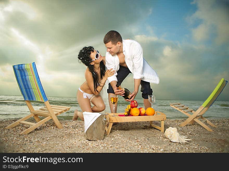 Couple resting on the beach