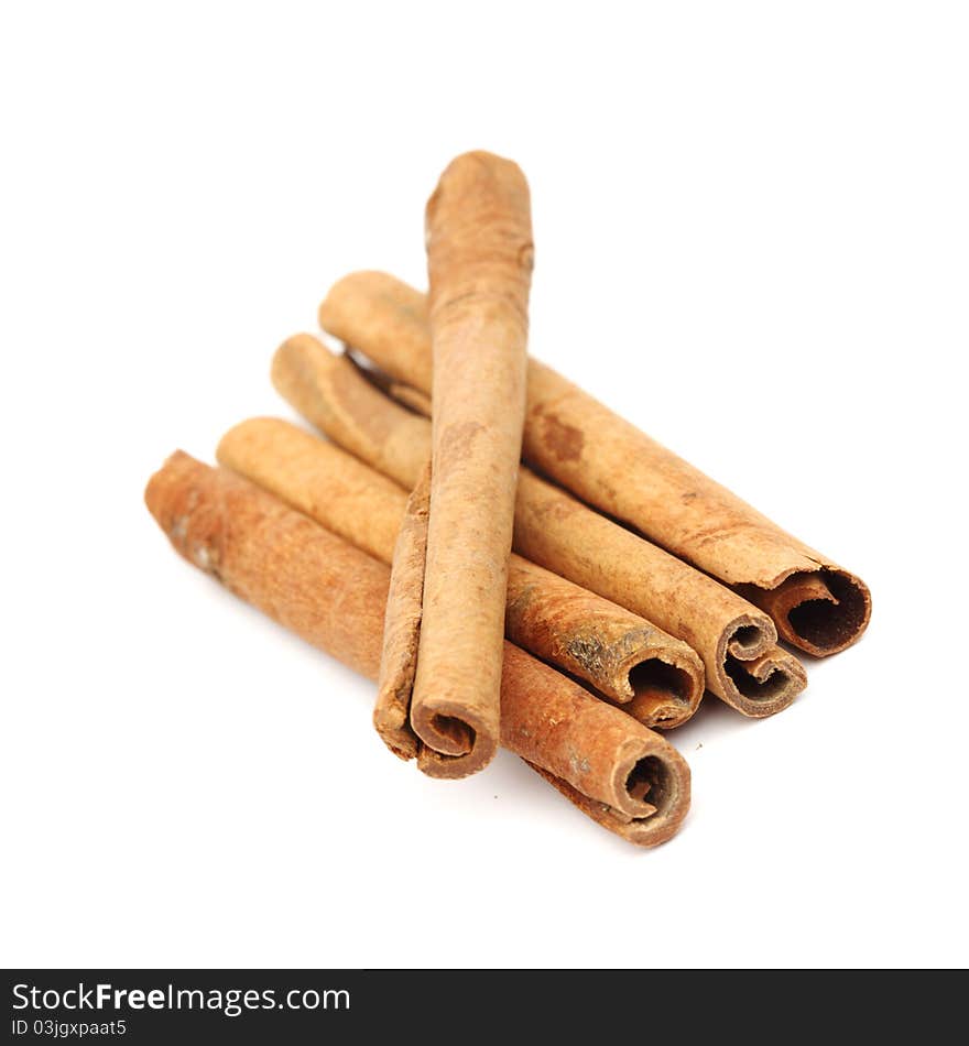 Cinnamon pile isolated on white