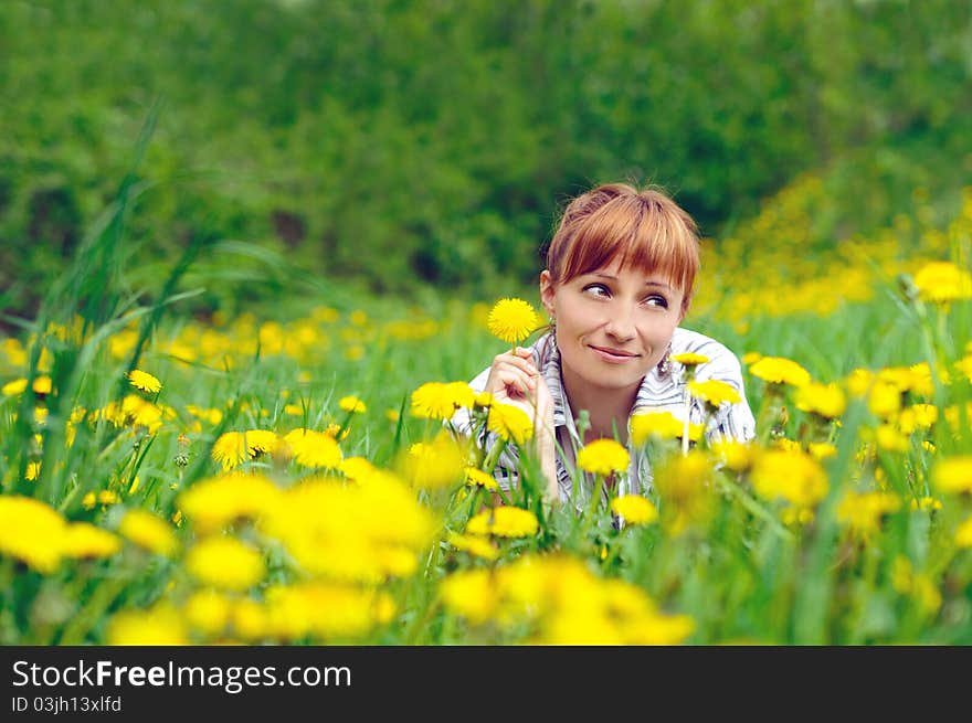 Red woman on the grass