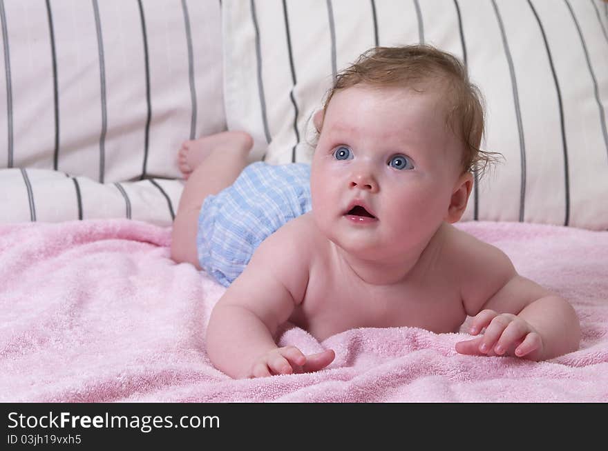 Little baby girl portrait over soft defocused background. Little baby girl portrait over soft defocused background