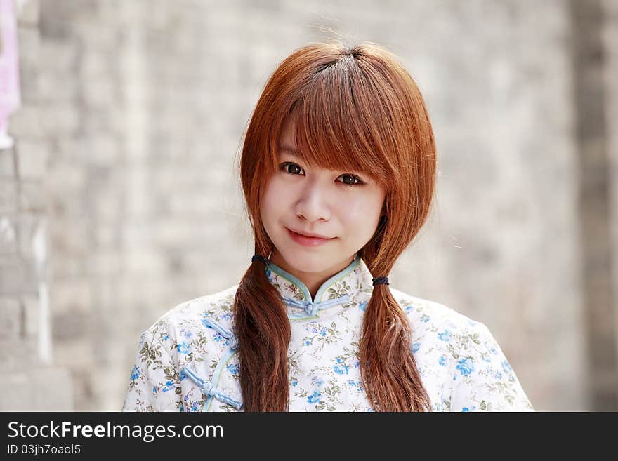 Chinese girl in traditional dress outdoor portrait. Chinese girl in traditional dress outdoor portrait.