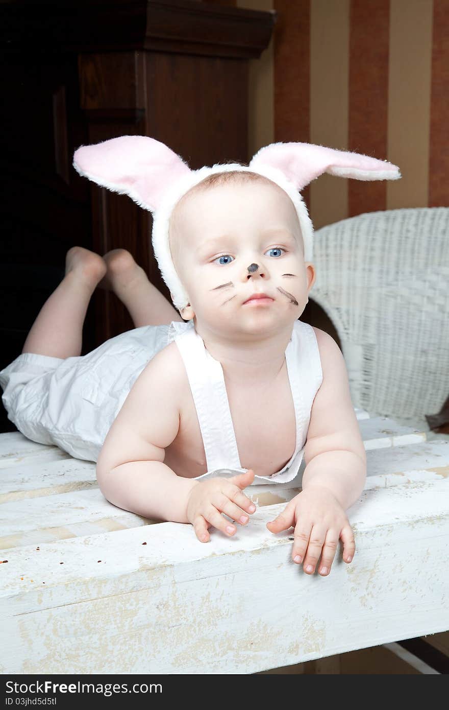 Portrait of  baby with  bunny ears . Portrait of  baby with  bunny ears .