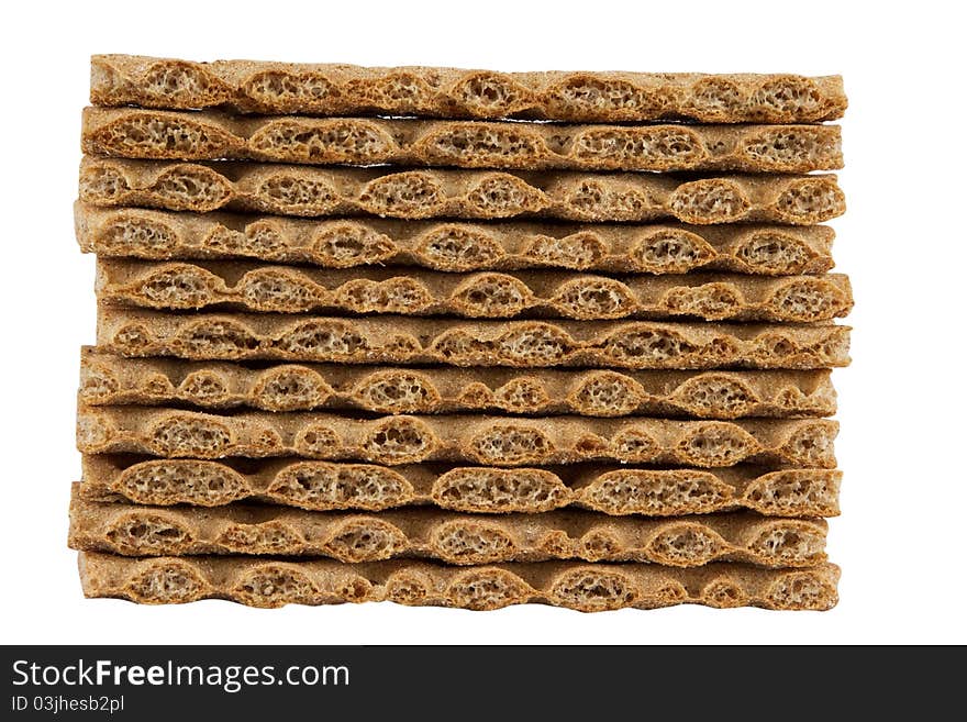 Stack of rye crispbread isolated on white background.