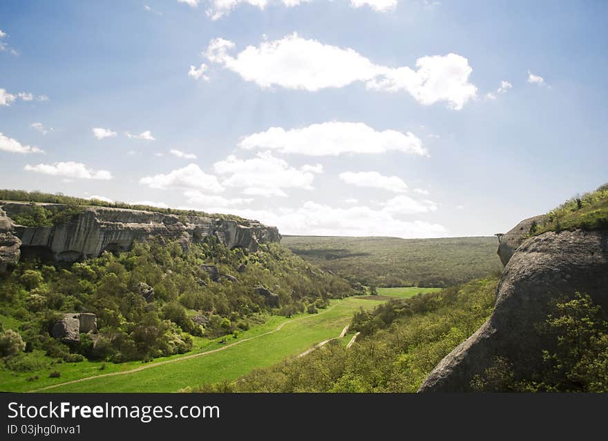 Landscape of mountains and fields of grass