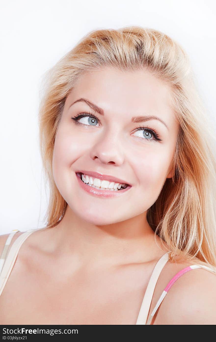 Attractive blonde smiling woman portrait on white background. Attractive blonde smiling woman portrait on white background