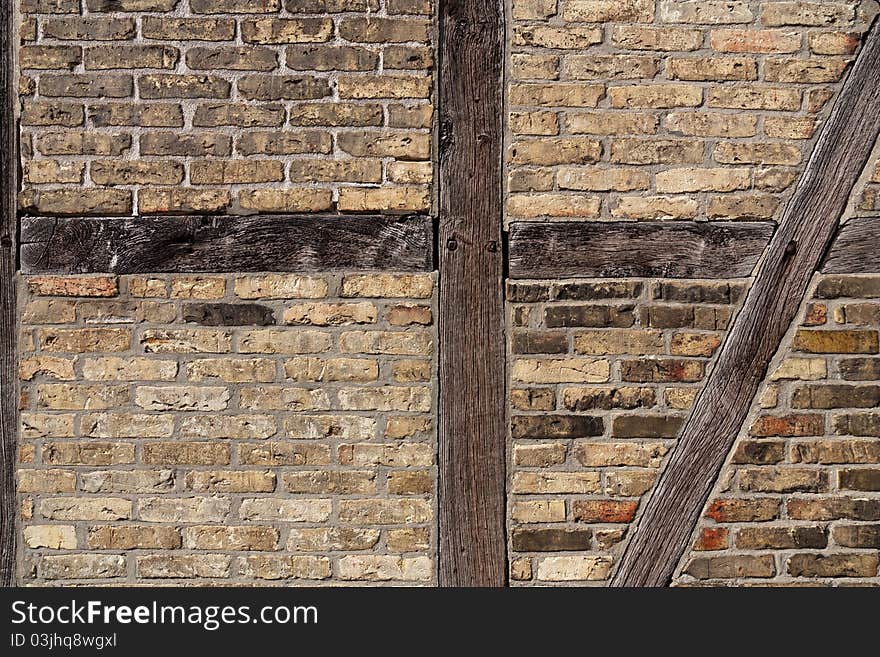 Old brick wall with framework