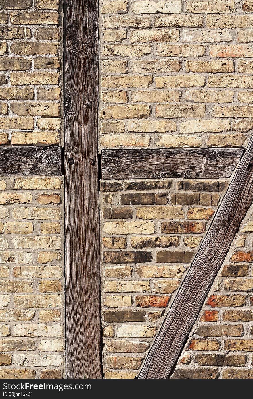 Old brick wall with framework