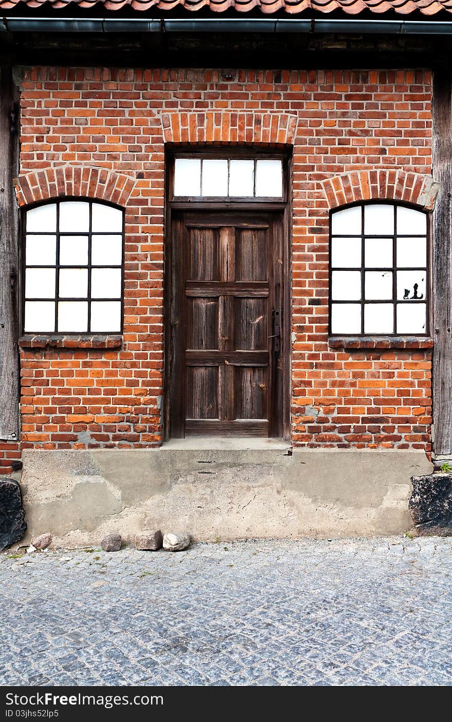 Old door with two windows. Old door with two windows