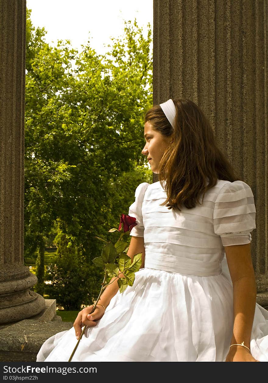 Beautiful girl in her first communion day