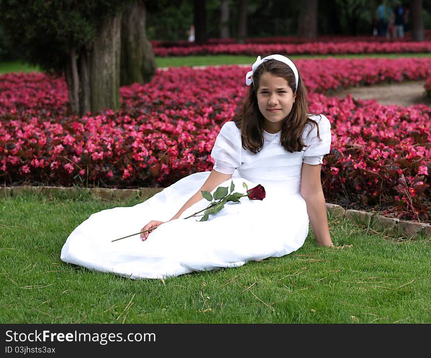 Beautiful girl in her first communion day