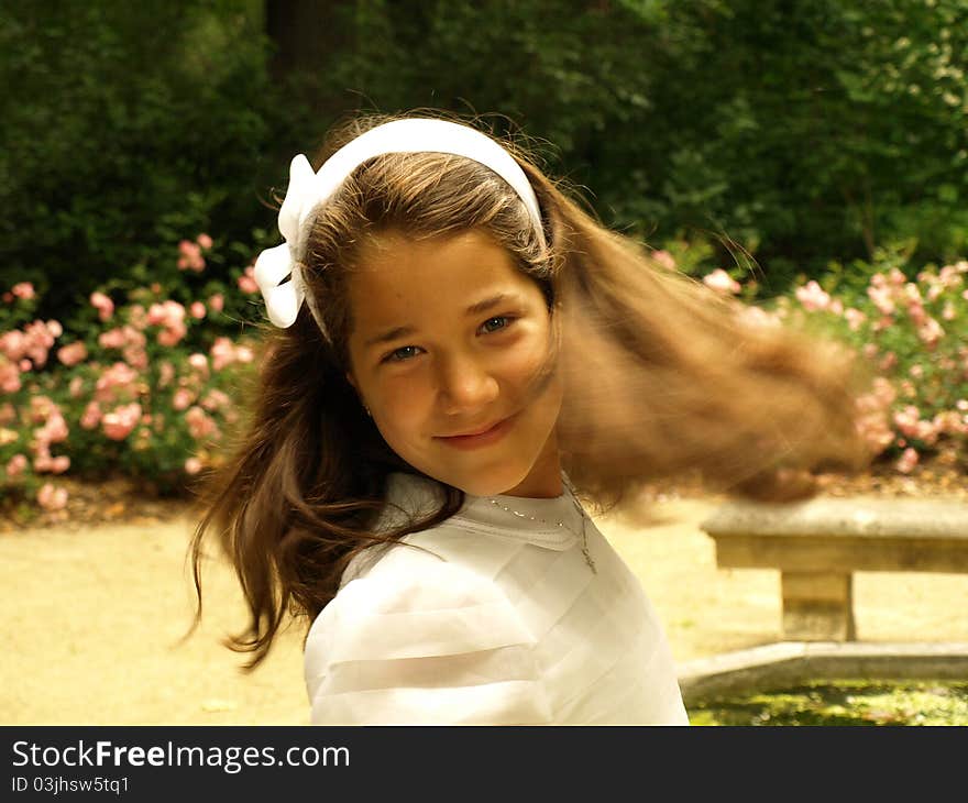 Beautiful girl in her first communion day