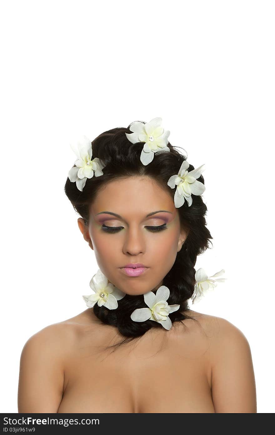 Attractive young beautiful natural model woman with chamomile flowers on head with hairstyle and eye makeup isolated over white background. Spring, summer girl, concept of healthy lifestyle metaphor. Attractive young beautiful natural model woman with chamomile flowers on head with hairstyle and eye makeup isolated over white background. Spring, summer girl, concept of healthy lifestyle metaphor