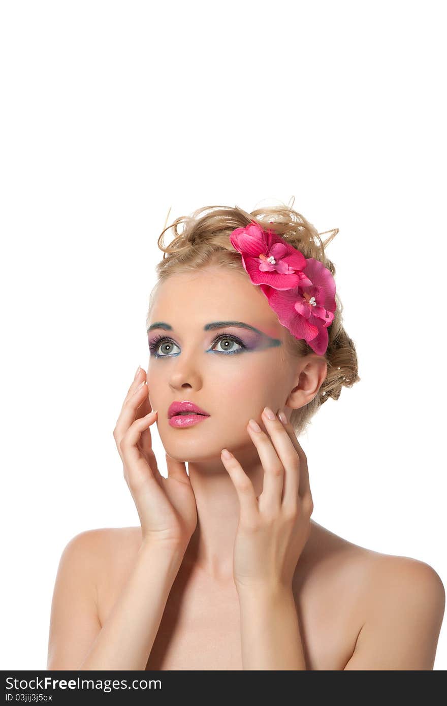 Attractive young beautiful natural model woman with orchid flower on head with hairstyle and eye makeup isolated over white background. Spring, summer girl, concept of healthy lifestyle metaphor. Attractive young beautiful natural model woman with orchid flower on head with hairstyle and eye makeup isolated over white background. Spring, summer girl, concept of healthy lifestyle metaphor