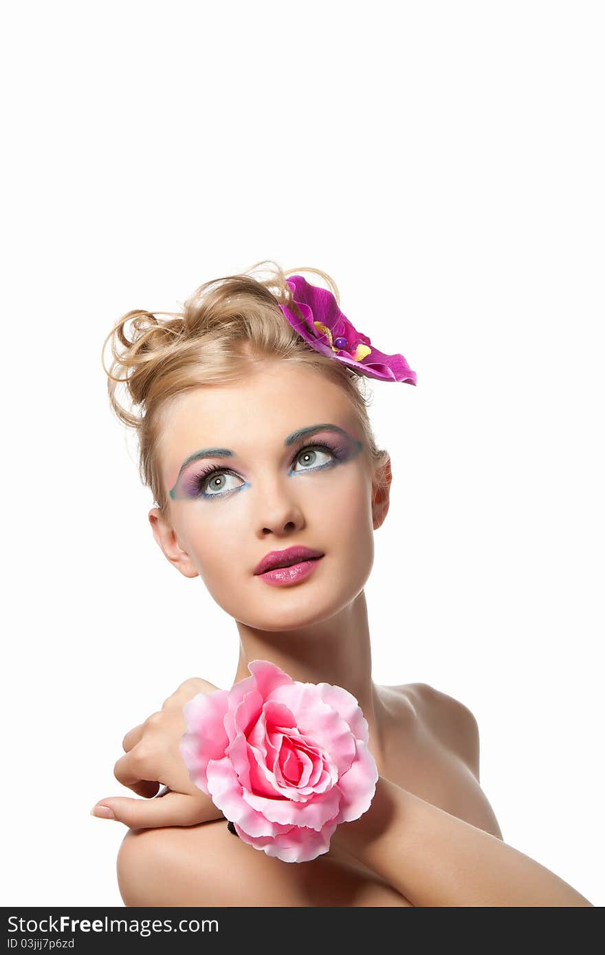 Attractive young beautiful natural model woman with orchid flower on head with hairstyle and eye makeup isolated over white background. Spring, summer girl, concept of healthy lifestyle metaphor. Attractive young beautiful natural model woman with orchid flower on head with hairstyle and eye makeup isolated over white background. Spring, summer girl, concept of healthy lifestyle metaphor