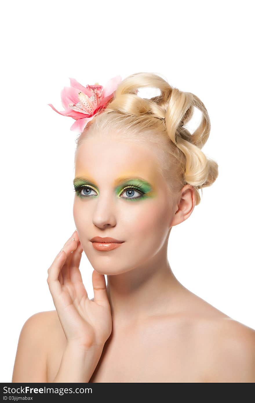 Attractive young beautiful natural model woman with orchid flower on head with hairstyle and eye makeup isolated over white background. Spring, summer girl, concept of healthy lifestyle metaphor. Attractive young beautiful natural model woman with orchid flower on head with hairstyle and eye makeup isolated over white background. Spring, summer girl, concept of healthy lifestyle metaphor