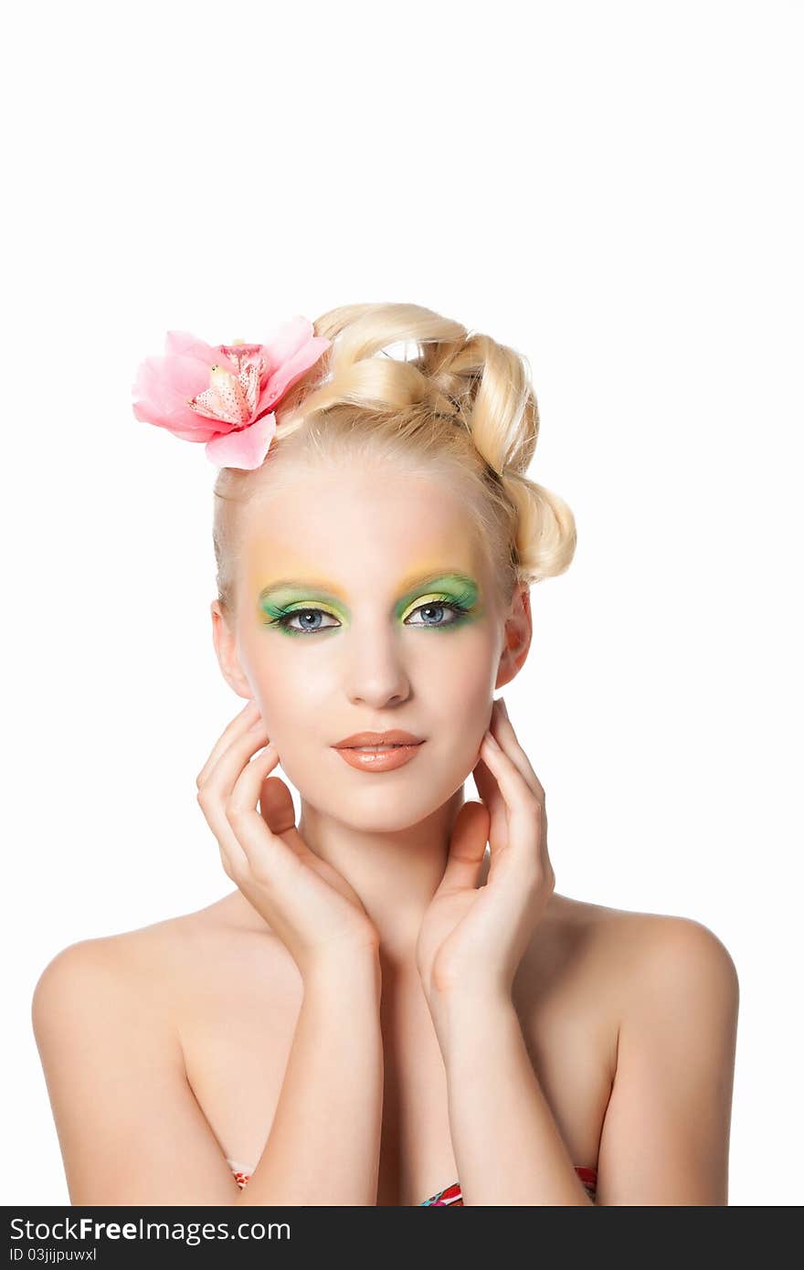 Attractive young beautiful natural model woman with orchid flower on head with hairstyle and eye makeup isolated over white background. Spring, summer girl, concept of healthy lifestyle metaphor. Attractive young beautiful natural model woman with orchid flower on head with hairstyle and eye makeup isolated over white background. Spring, summer girl, concept of healthy lifestyle metaphor