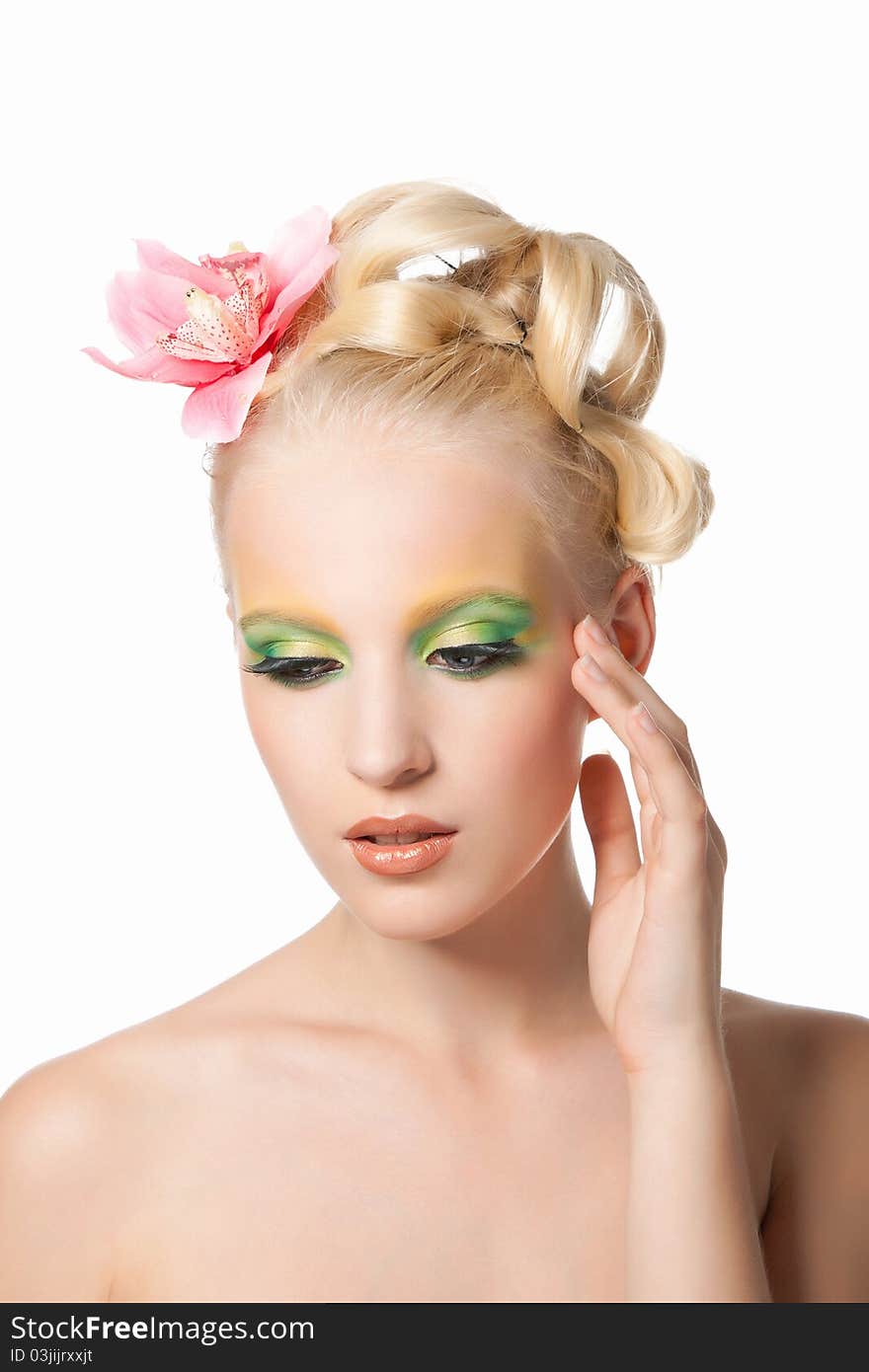 Attractive young beautiful natural model woman with orchid flower on head with hairstyle and eye makeup isolated over white background. Spring, summer girl, concept of healthy lifestyle metaphor. Attractive young beautiful natural model woman with orchid flower on head with hairstyle and eye makeup isolated over white background. Spring, summer girl, concept of healthy lifestyle metaphor