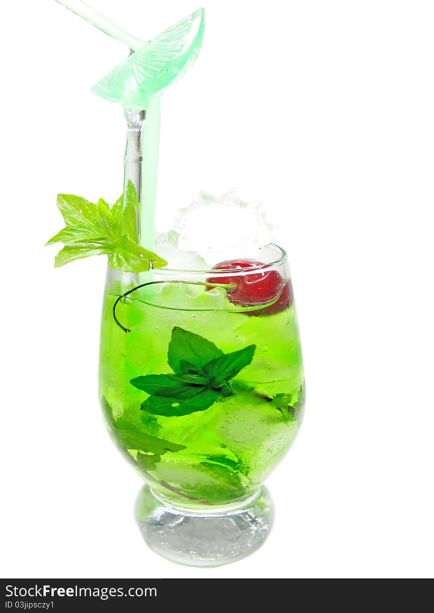 Alcohol green curacao liqueur cocktail with cherry