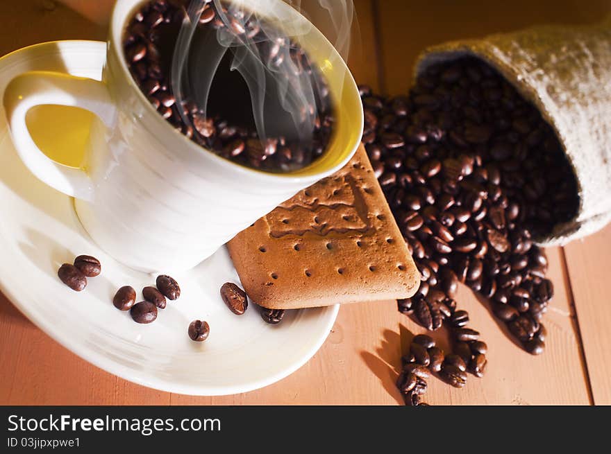 Coffee, coffee beans and on the table. Coffee, coffee beans and on the table