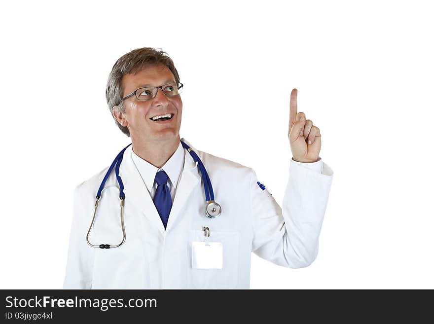 Elderly doctor looks and points to ad space and smiles. Isolated on white background. Elderly doctor looks and points to ad space and smiles. Isolated on white background.