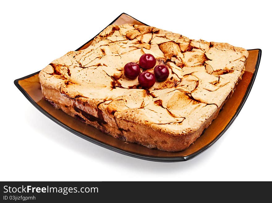 Cherry pie on a plate isolated on white