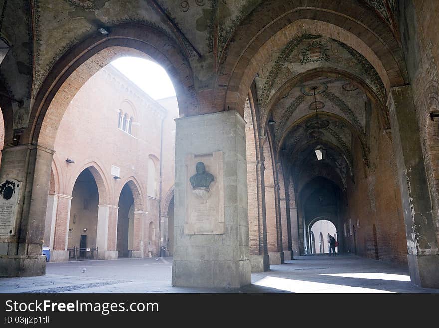 Medieval court with fresco shining by the sun