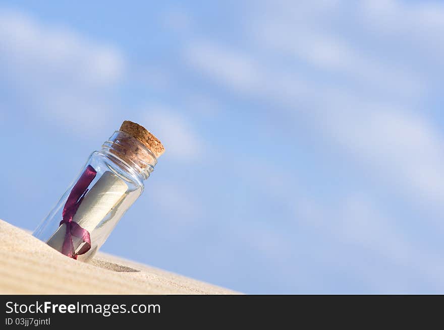 A bottle with a note inside it. A bottle with a note inside it