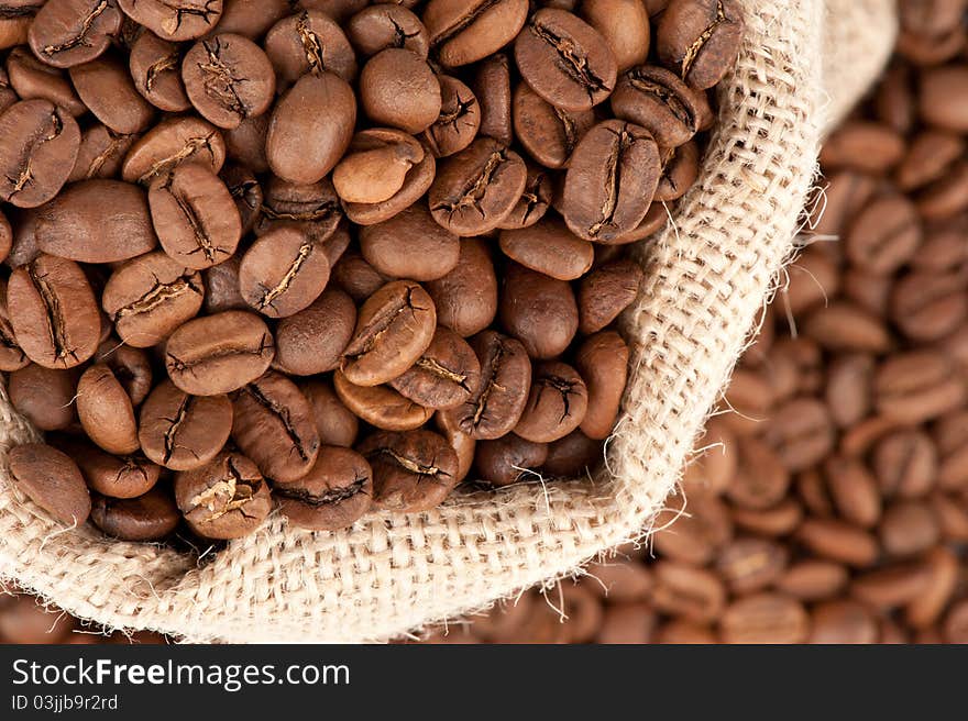 Closeup of coffee beans in canvas sack