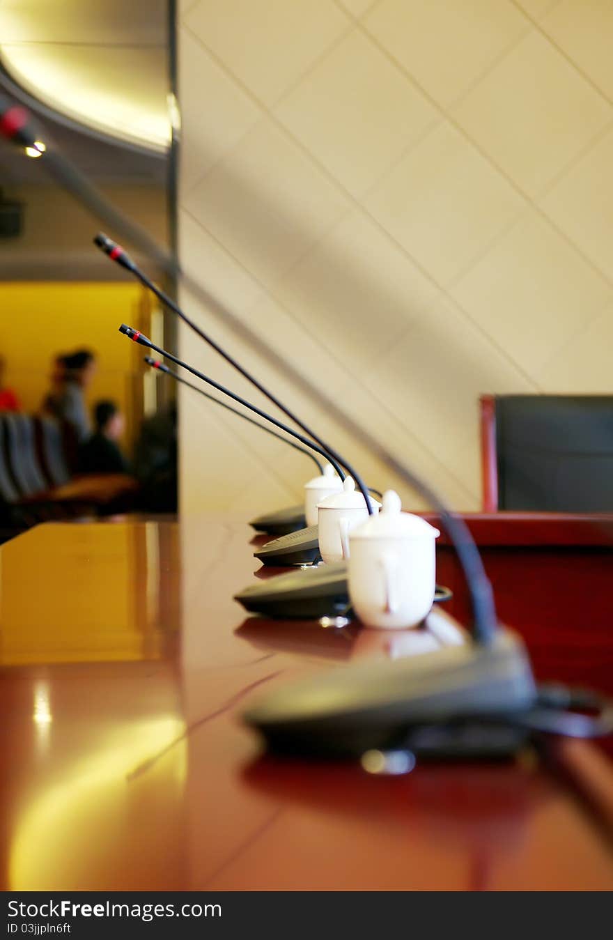 Microphones on the table in a meeting room. Microphones on the table in a meeting room