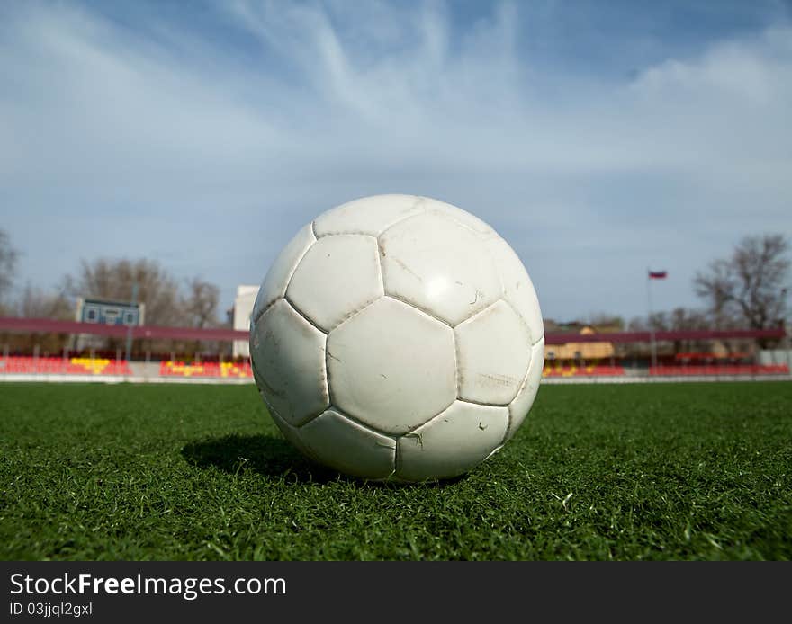 Soccer ball on the field of stadium with light