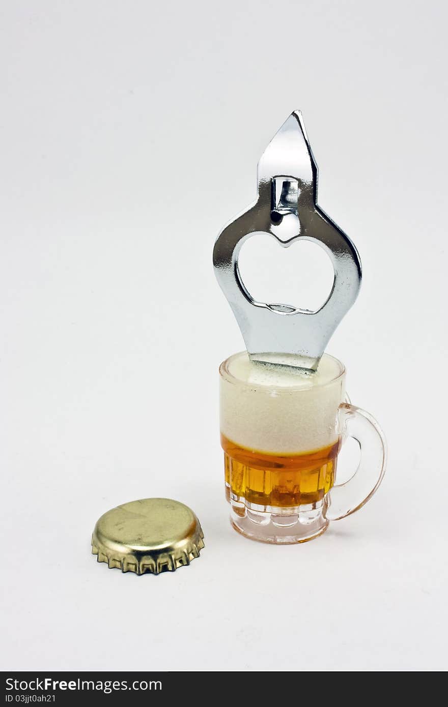 Beer bottle opener with cap isolated on a white background