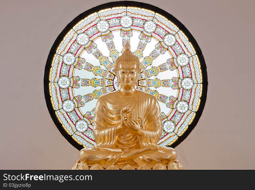 Gold statue image of buddha at Phetchabun province, Thailand. The temple open to the public to watch. And allowed to take photos in the temple. no restriction in copy or use, no name of artist appear. This photo is taken under these conditions.