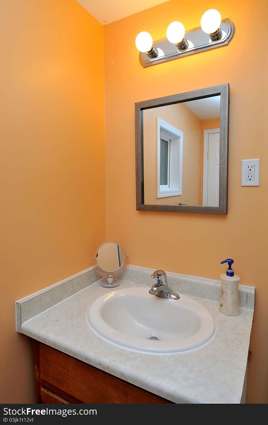 Interior of luxurious bathroom showing white wash basin. Interior of luxurious bathroom showing white wash basin.